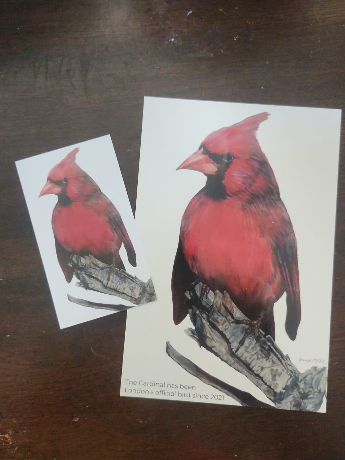 Signs are coming... postcards too. And they have art on them!